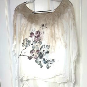 Off white color 2 layer top. With beaded flowers size M